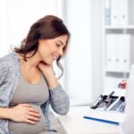 Pregnant woman viewing ultrasound images